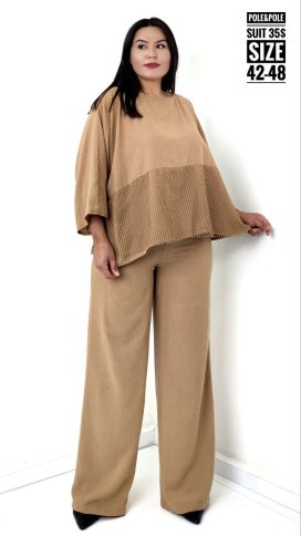 ASYMMETRICAL TOP WITH NET DETAIL AND MATCHING PANTS